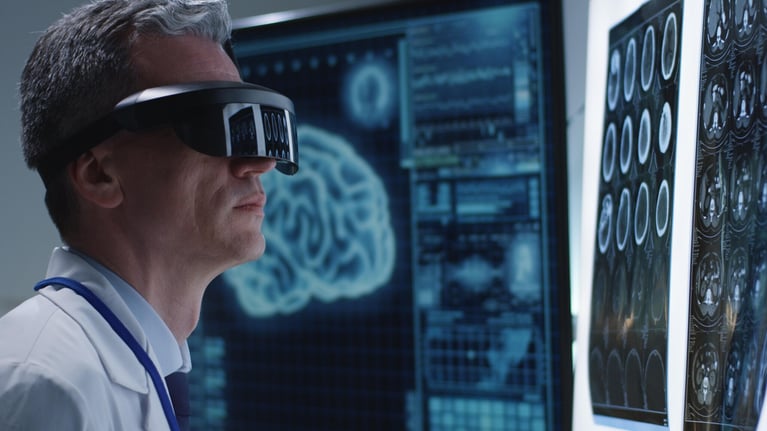doctor-examining-brain-scans-with-vr-glasses.jpg