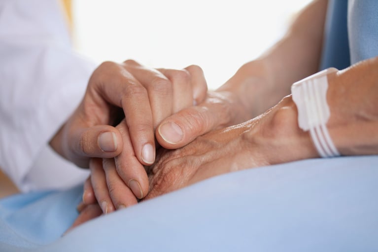 doctor-holding-patients-hand.jpg