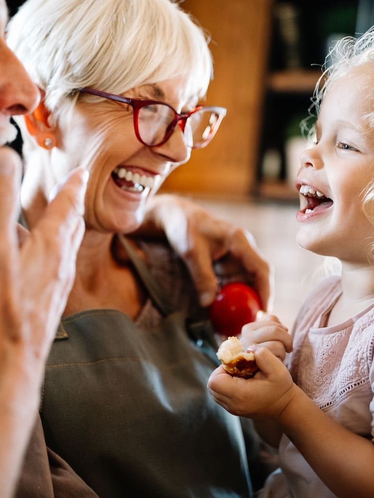 happy grandparents playing with their little cute 3XA2NRV