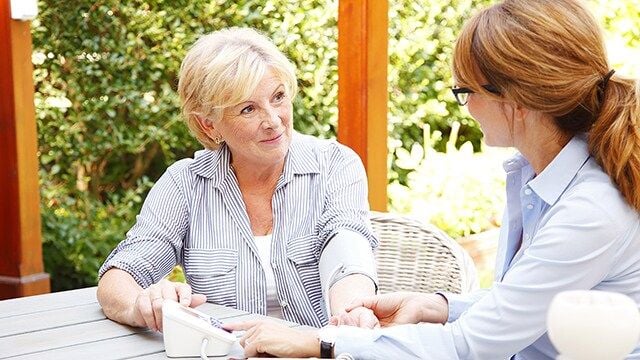 elderly_woman_with_home_nurse_640.jpg