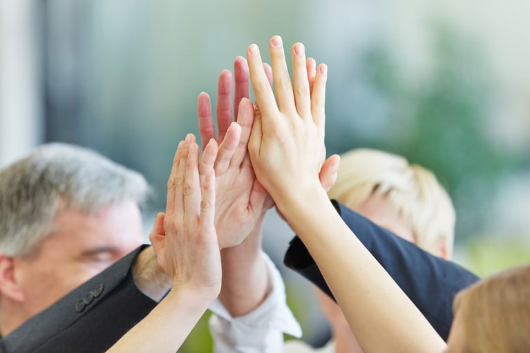 several-hands-giving-high-five.jpg