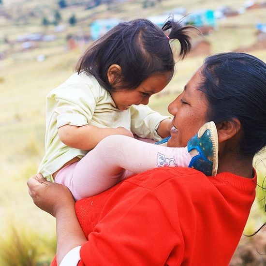 South american farmer with daughter 1 small