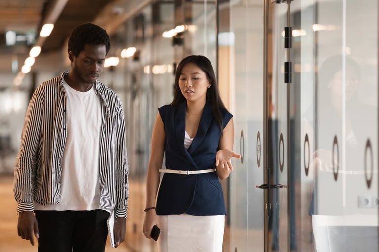 multiethnic_employees_discussing_3.jpeg