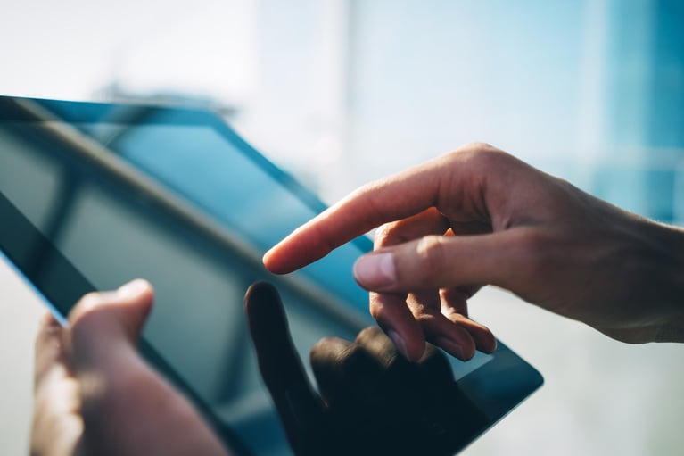 finger-tipping-at-tablet-1.jpg