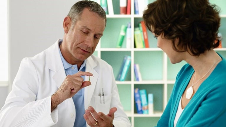 A doctor and patient discussing the IUS.