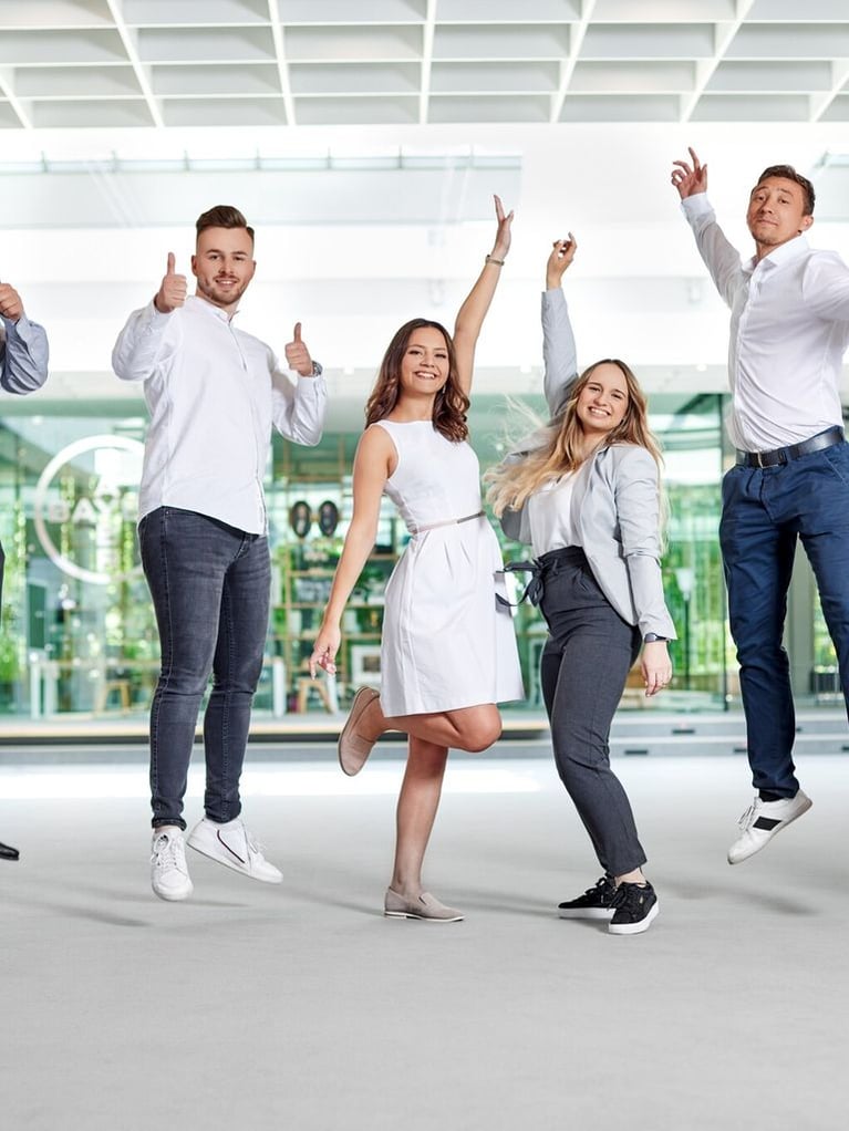 Trainees jumping for joy