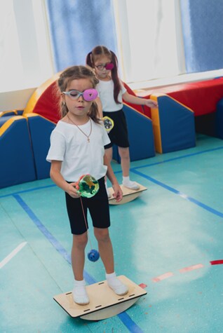 little-girl-playing-318x475.png