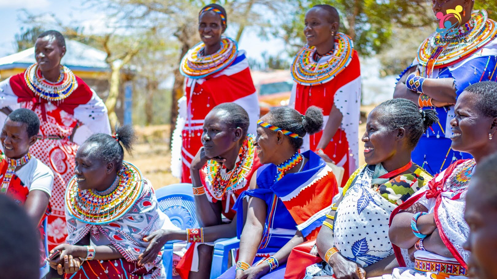 Maasai-Woman-Participating-in-Conversation.jpg