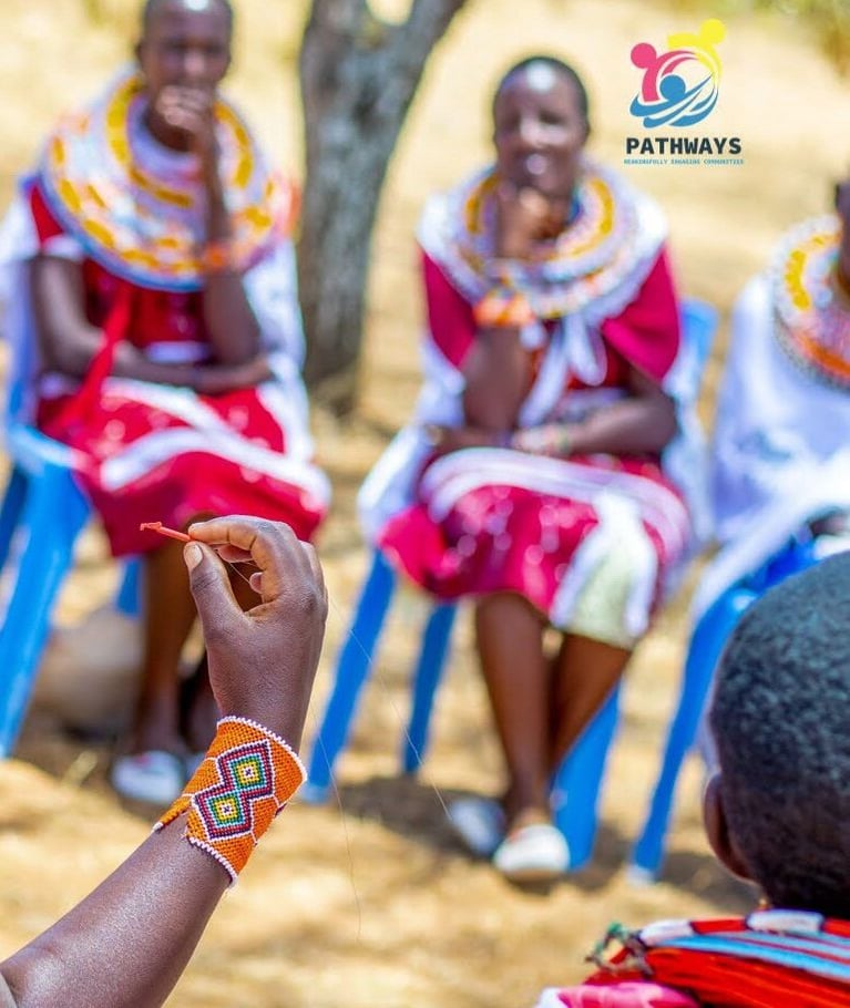 Maasai-Women-Holding-Mirena-1.jpg