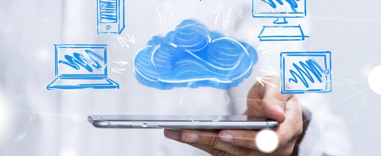 Man_with_smartphone_and_cloud_computer_icons_1440x590.jpg