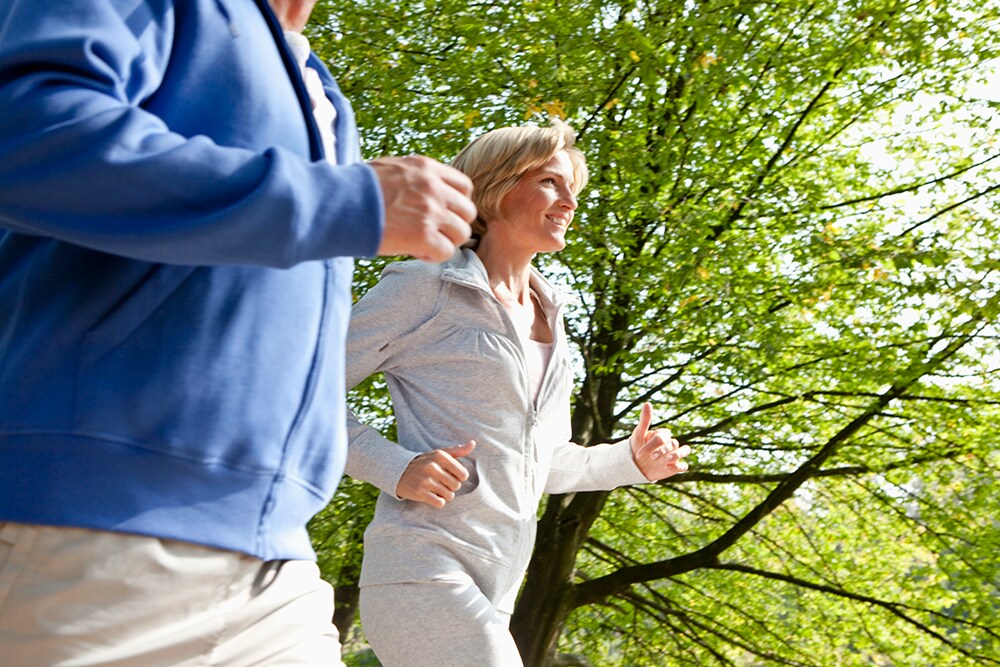 middle-aged-couple-jogging.png