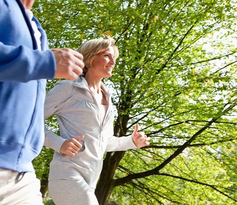 middle-aged-couple-jogging.png