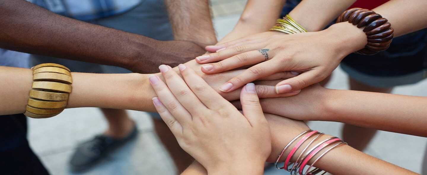 Multiethnic_hands_added_togeth_1.jpg