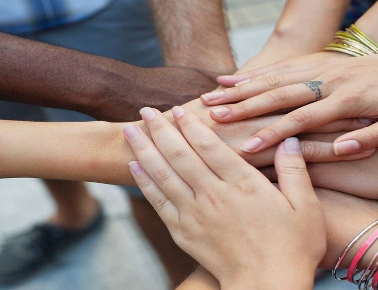 Multiethnic_hands_added_togeth_1.jpg