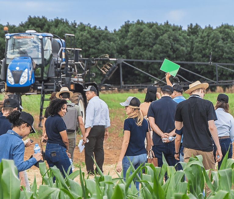 people-shooting-a-video-on-a-crop-field.png