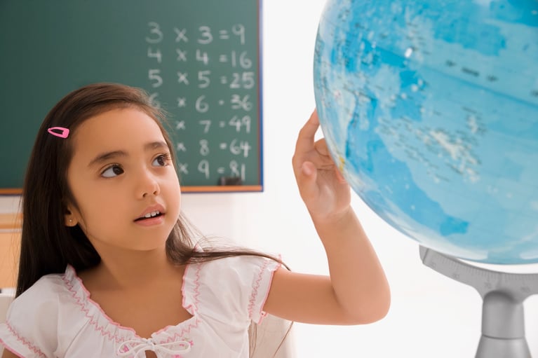 schoolgirl_showing_globe.jpg