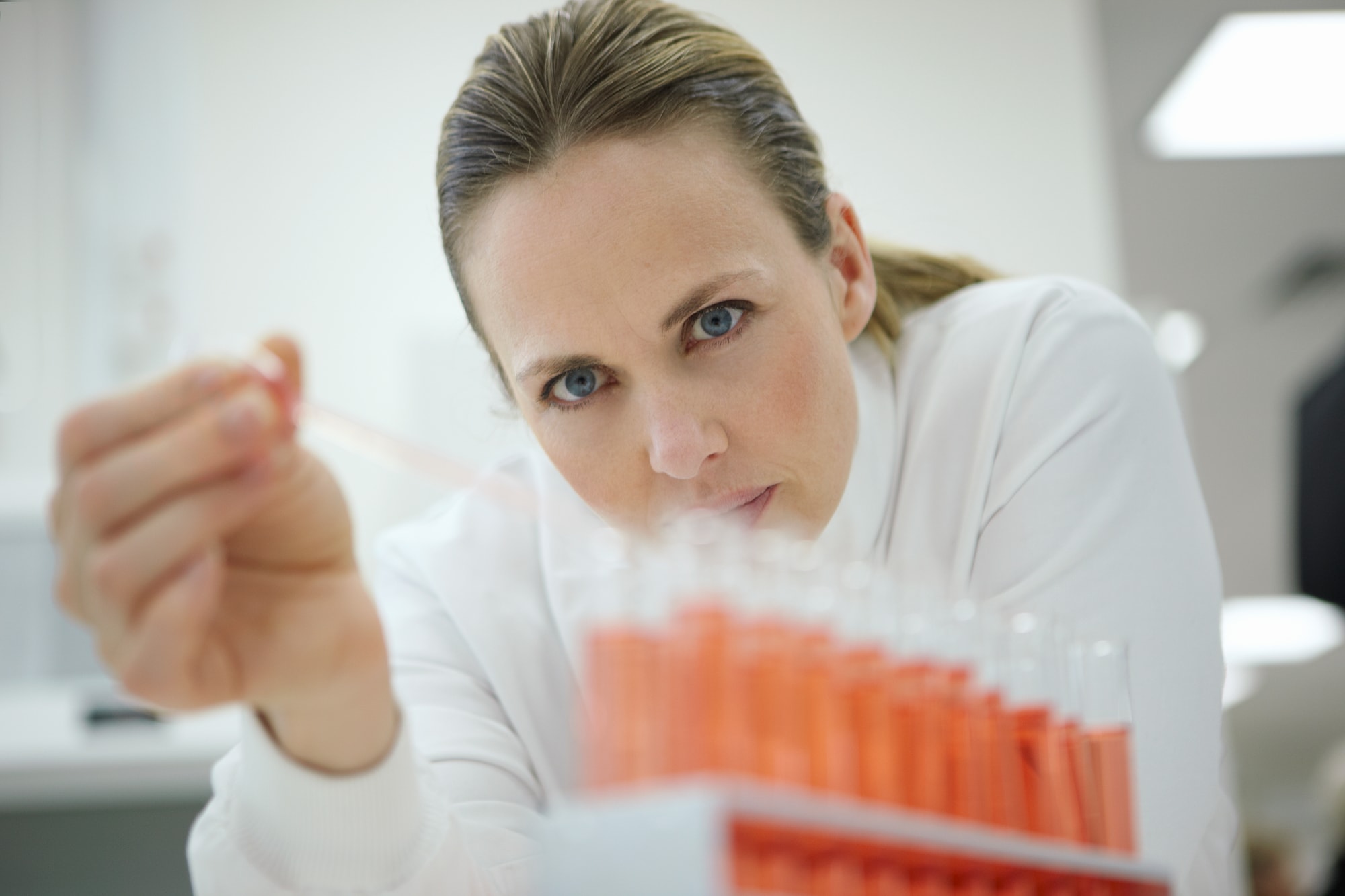 Scientist_filling_test_tubes.jpg