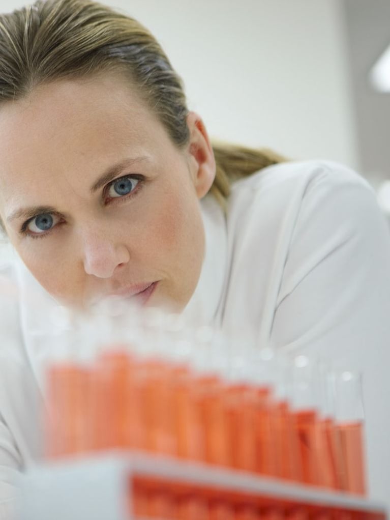 Scientist_filling_test_tubes.jpg