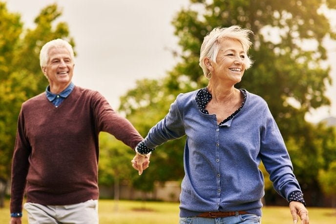 Senior_couple_walking_in_the_park_v2.jpg
