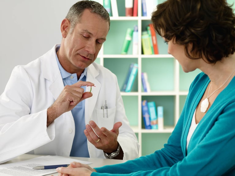 A doctor and patient discussing the IUS.