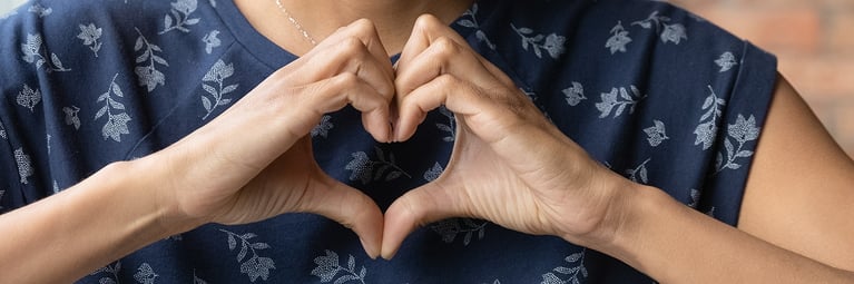 woman-showing-heart-symbol-1.png