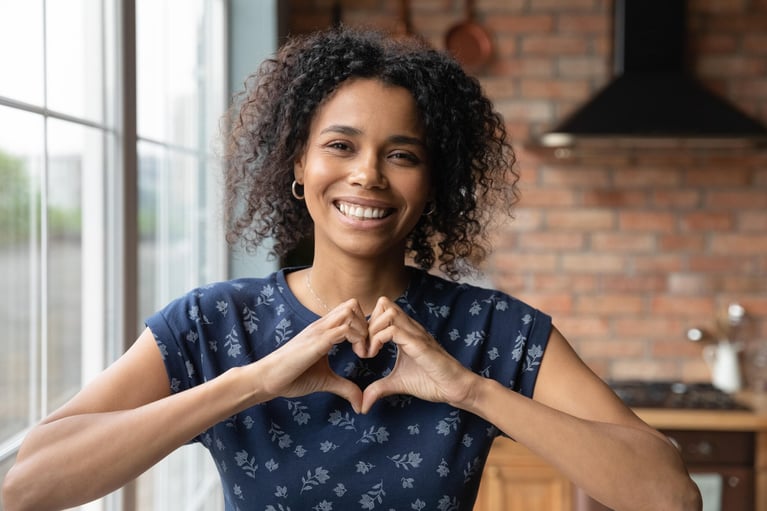 woman-showing-heart-symbol.jpg