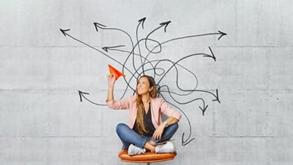 young-woman-with-paper-air-plane-426x240.jpg